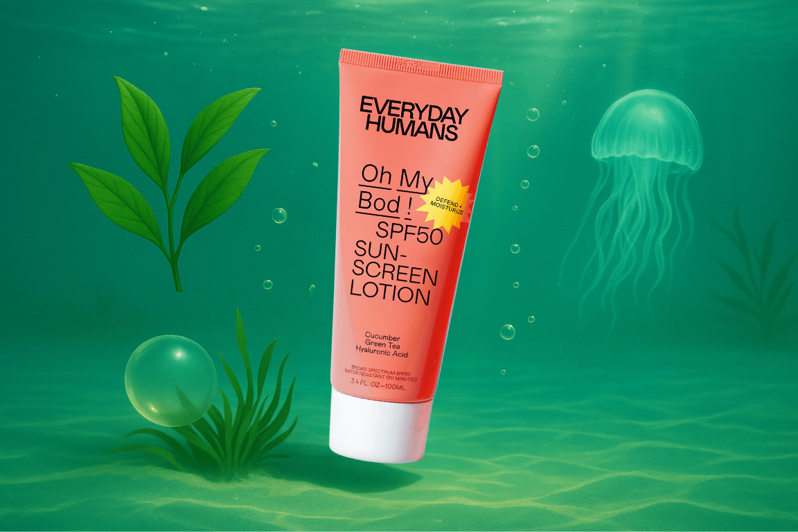 Everyday Humans Oh My Bod! SPF 50 zonnebrand in koraalkleurige tube, omringd door zeeplanten en kwallen in een turquoise onderwateromgeving.